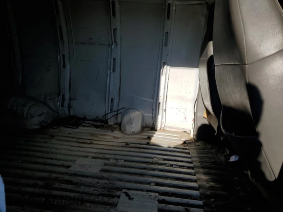 2003 GMC Savana Cargo Van with VIN 1GTGG25U031121692, listed as a Copart auction lot 70495844 with 57,614 mi miles and Salvage Title. Bid and sale history available at carsss.com. Image 11.