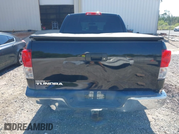 2012 Toyota Tundra z VIN 5TFRY5F17CX127160, wystawiony jako IAAI lot #42256016 z przebiegiem 203 648 mil mil oraz . Historia ofert i sprzedaży dostępna na DreamBid. Obrazek 16.