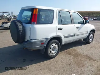 2000 Honda CR-V LX with VIN JHLRD1849YS016998, listed as a IAAI auction lot 42164944 with 124,320 mi miles and . Bid and sale history available at DreamBid. Image 4.