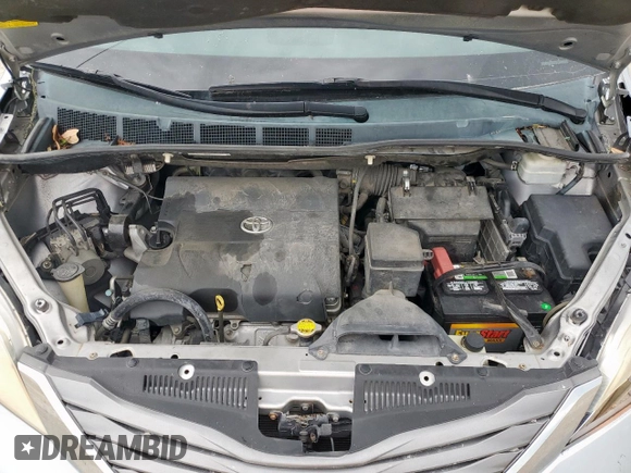 2013 Toyota Sienna XLE AAS with VIN 5TDYK3DC6DS291562, listed as a Copart auction lot 62411965 with 150,505 mi miles and Salvage title. Bid and sale history available at DreamBid. Image 12.