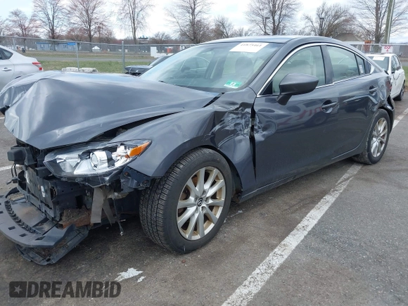 2014 Mazda 6 i Sport with VIN JM1GJ1U51E1111018, listed as a IAAI auction lot 41875461 with 253,755 mi miles and . Bid and sale history available at DreamBid. Image 17.