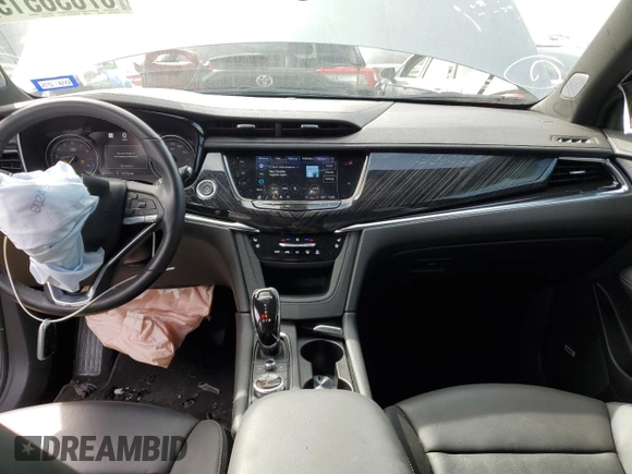 2023 Cadillac XT6 FWD Premium Luxury with VIN 1GYKPCRS4PZ124119, listed as a Copart auction lot 87836515 with 14,752 mi miles and Salvage title. Bid and sale history available at DreamBid. Image 8.