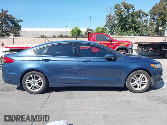 2018 Ford Fusion SE with VIN 3FA6P0HD4JR161780, listed as a IAAI auction lot 42527140 with 89,419 mi miles and . Bid and sale history available at DreamBid. Image 13.