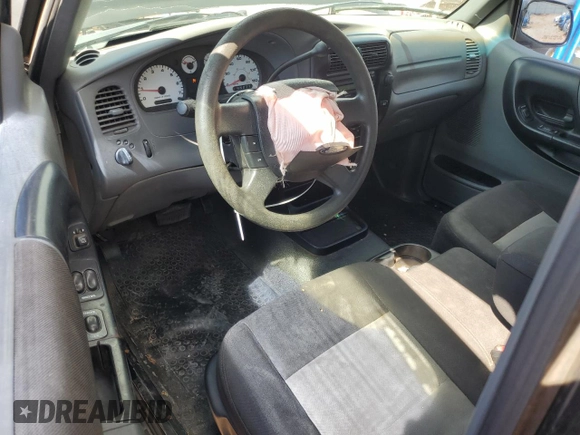 2004 Ford Ranger XL with VIN 1FTYR14U94PB65604, listed as a Copart auction lot 62317165 with 151,098 mi miles and Salvage title. Bid and sale history available at DreamBid. Image 8.
