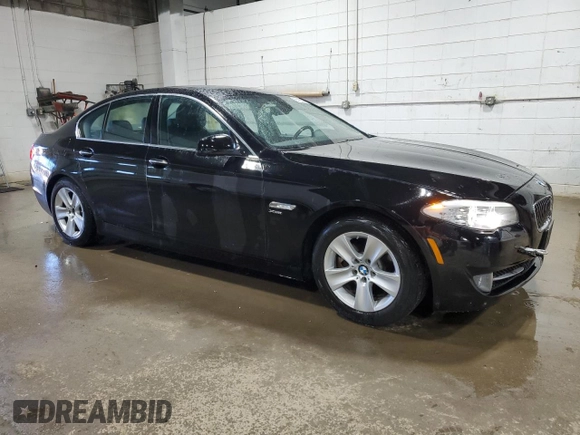 2012 BMW 5 Series 528i xDrive with VIN WBAXH5C50CDW09515, listed as a Copart auction lot 55122825 with 124,601 mi miles and Clean Title. Bid and sale history available at DreamBid. Image 4.