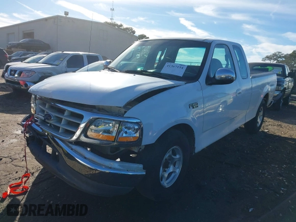 1999 Ford F-150 with VIN 1FTZX1728XNA81813, listed as a IAAI auction lot 41367154 with 149,103 mi miles and . Bid and sale history available at DreamBid. Image 17.