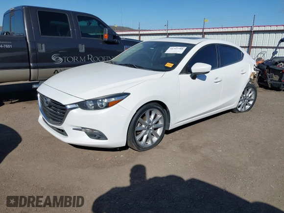 2017 Mazda 3 Grand Touring z VIN 3MZBN1W34HM139393, wystawiony jako IAAI lot #41747788 z przebiegiem 137 275 mil mil oraz . Historia ofert i sprzedaży dostępna na DreamBid. Obrazek 2.