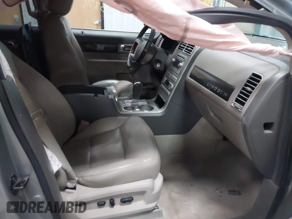 2007 Lincoln MKX with VIN 2LMDU68C77BJ26565, listed as a IAAI auction lot 41733876 with 173,037 mi miles. Bid and sale history available at carsss.com. Image 5.