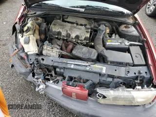 1997 Saturn SL z VIN 1G8ZH5285VZ188074, wystawiony jako Copart lot #51501005 z przebiegiem 125 973 mil mil oraz Nie do naprawy • Non repairable. Historia ofert i sprzedaży dostępna na DreamBid. Obrazek 11.
