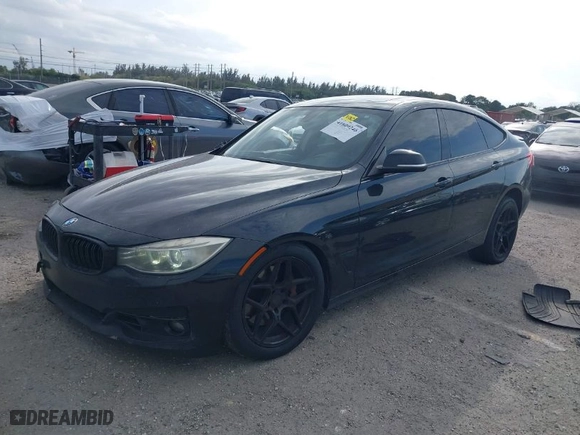 2014 BMW 3 Series Gran Turismo 335i xDrive with VIN WBA3X9C58ED153467, listed as a IAAI auction lot 41609246 with 219,204 mi miles. Bid and sale history available at carsss.com. Image 2.