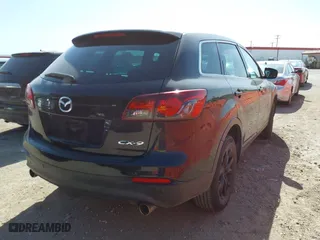 2015 Mazda CX-9 Touring with VIN JM3TB2CV2F0458844, listed as a IAAI auction lot 41852818 with 169,089 mi miles. Bid and sale history available at carsss.com. Image 4.