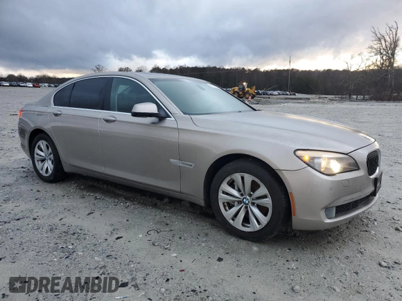 2012 BMW 7 Series 740i with VIN WBAKA4C56CDS99041, listed as a Copart auction lot 41436735 with 170,059 mi miles and Clean title. Bid and sale history available at DreamBid. Image 4.