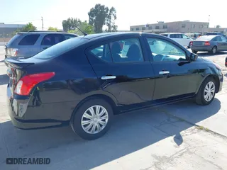 2016 Nissan Versa S with VIN 3N1CN7AP5GL916658, listed as a IAAI auction lot 42093204 with 112,085 mi miles. Bid and sale history available at carsss.com. Image 4.