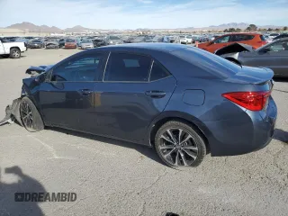 2019 Toyota Corolla L with VIN 2T1BURHE4KC184532, listed as a Copart auction lot 87870635 with 82,357 mi miles and Salvage Title. Bid and sale history available at DreamBid. Image 2.