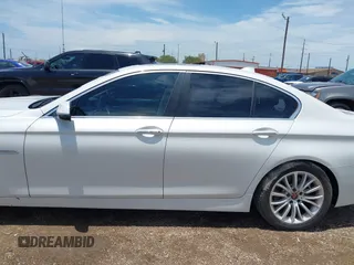 2014 BMW 5 Series 528i z VIN WBA5A5C5XED501949, wystawiony jako IAAI lot #42487130 z przebiegiem 142 445 mil mil oraz . Historia ofert i sprzedaży dostępna na DreamBid. Obrazek 14.