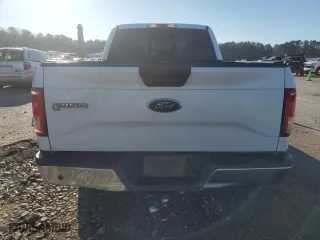 2015 Ford F-150 XLT w/HD Payload Pkg with VIN 1FTFW1EG1FKD03354, listed as a Copart auction lot 87190684 with 185,579 mi miles and Salvage Title. Bid and sale history available at carsss.com. Image 6.