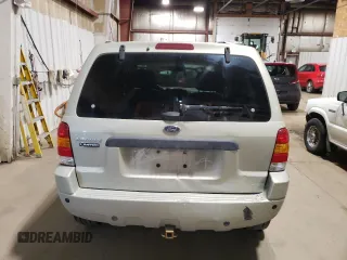 2004 Ford Escape Limited z VIN 1FMCU94124KA53894, wystawiony jako Copart lot #62788415 z przebiegiem 177 654 mil mil oraz Szkoda całkowita • Salvage title. Historia ofert i sprzedaży dostępna na DreamBid. Obrazek 6.