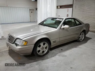 1999 Mercedes-Benz SL-Class with VIN WDBFA68F9XF172312, listed as a Copart auction lot 61248884 with 104,331 mi miles and Salvage Title. Bid and sale history available at carsss.com. Image 1.