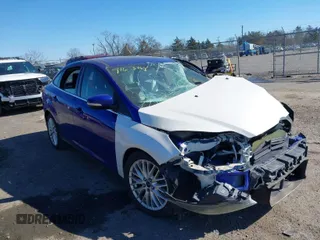 2014 Ford Focus Titanium with VIN 1FADP3J21EL427066, listed as a IAAI auction lot 41653163 with 1 mi miles. Bid and sale history available at carsss.com. Image 1.