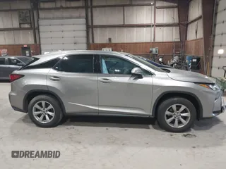 2019 Lexus RX 350 z VIN 2T2BZMCA6KC207961, wystawiony jako IAAI lot #42149305 z przebiegiem 130 806 mil mil oraz . Historia ofert i sprzedaży dostępna na DreamBid. Obrazek 13.