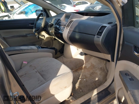 2005 Toyota Prius z VIN JTDKB20UX53056020, wystawiony jako IAAI lot #41829041 z przebiegiem 224 762 mil mil oraz . Historia ofert i sprzedaży dostępna na DreamBid. Obrazek 5.