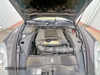 2014 Porsche Cayenne z VIN WP1AA2A25ELA97360, wystawiony jako Copart lot #59060675 z przebiegiem 181 114 mil mil oraz Tytuł czysty. Historia ofert i sprzedaży dostępna na DreamBid. Obrazek 7.