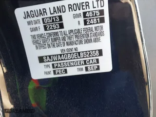 2014 Jaguar XK with VIN SAJWA4GB0ELB52358, listed as a IAAI auction lot 41832850 with 93,037 mi miles. Bid and sale history available at carsss.com. Image 9.