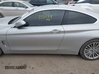 2014 BMW 4 Series 428i xDrive with VIN WBA3N5C53EF716542, listed as a IAAI auction lot 41157641 with 135,264 mi miles and . Bid and sale history available at DreamBid. Image 14.