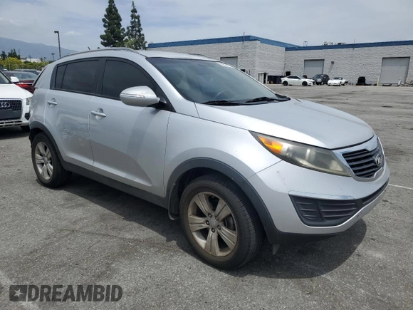 2013 Kia Sportage LX z VIN KNDPB3A26D7357884, wystawiony jako Copart lot #55836165 z przebiegiem 140 252 mil mil oraz Szkoda całkowita • Salvage title. Historia ofert i sprzedaży dostępna na DreamBid. Obrazek 4.