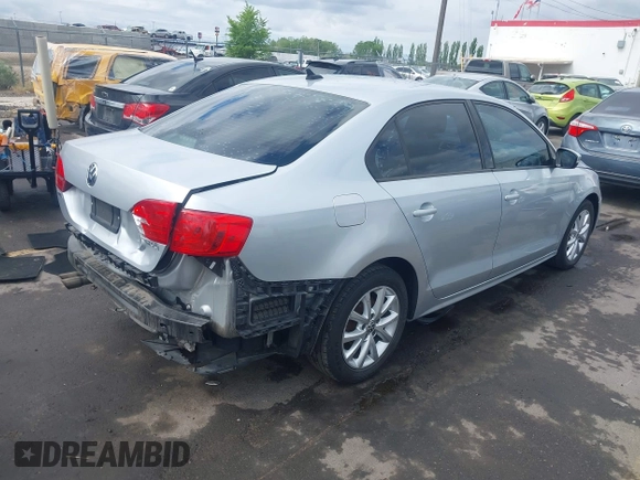 2011 Volkswagen Jetta SE z VIN 3VWDZ7AJ7BM340220, wystawiony jako IAAI lot #42136168 z przebiegiem 147 864 mil mil oraz . Historia ofert i sprzedaży dostępna na DreamBid. Obrazek 4.