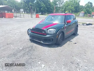 2023 MINI Countryman John Cooper Works z VIN WMZ33BS09P3R00627, wystawiony jako IAAI lot #42419212 z przebiegiem 12 260 mil mil oraz . Historia ofert i sprzedaży dostępna na DreamBid. Obrazek 2.