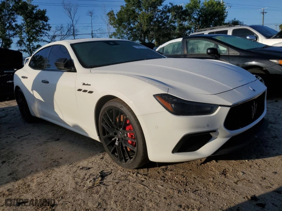 2023 Maserati Ghibli Modena with VIN ZAM57YSMXPX411516, listed as a Copart auction lot 73631704 with 0 mi miles and Salvage Title. Bid and sale history available at carsss.com. Image 4.