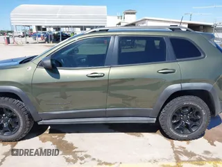 2019 Jeep Cherokee Trailhawk Elite with VIN 1C4PJMBN7KD287506, listed as a IAAI auction lot 42072589 with 108,034 mi miles and . Bid and sale history available at DreamBid. Image 14.