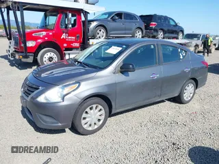 2016 Nissan Versa SV with VIN 3N1CN7AP9GL819060, listed as a IAAI auction lot 42073036 with 143,186 mi miles. Bid and sale history available at carsss.com. Image 2.