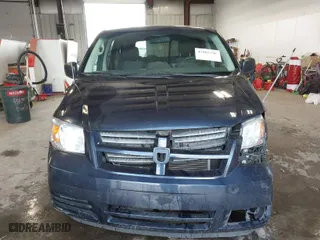 2009 Dodge Grand Caravan SE with VIN 1D8HN44E39B502635, listed as a IAAI auction lot 42003196 with 119,887 mi miles. Bid and sale history available at carsss.com. Image 12.