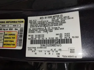 2013 Lincoln MKZ Hybrid with VIN 3LN6L2LU2DR821615, listed as a IAAI auction lot 42129870 with 137,833 mi miles. Bid and sale history available at carsss.com. Image 9.