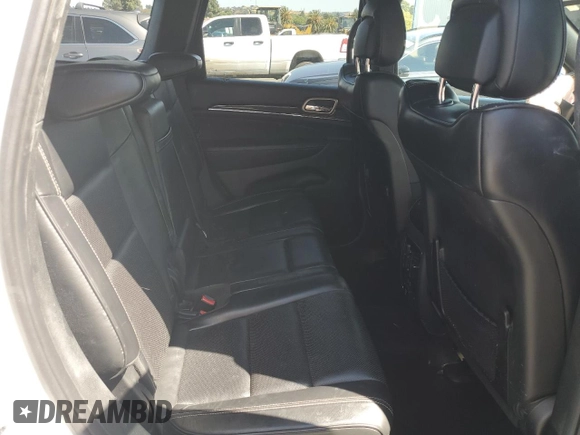 2017 Jeep Grand Cherokee Overland with VIN 1C4RJFCT5HC777748, listed as a Copart auction lot 63121635 with 106,991 mi miles and Salvage title. Bid and sale history available at DreamBid. Image 11.