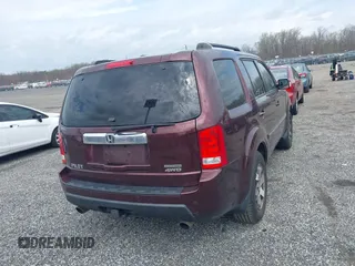 2010 Honda Pilot Touring with VIN 5FNYF4H95AB040721, listed as a IAAI auction lot 41928412 with 213,219 mi miles and . Bid and sale history available at carsss.com. Image 16.
