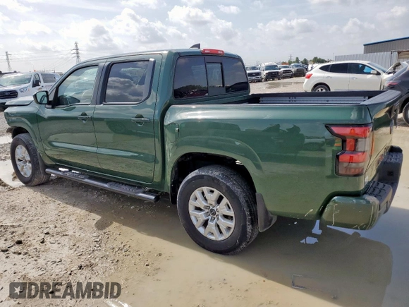 2022 Nissan Frontier Pro-4X with VIN 1N6ED1EK5NN691351, listed as a Copart auction lot 65206915 with 64,610 mi miles and Salvage title. Bid and sale history available at DreamBid. Image 2.