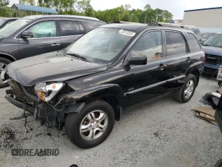 2005 Kia Sportage LX z VIN KNDJE723357092757, wystawiony jako Copart lot #52819365 z przebiegiem 233 832 mil mil oraz Szkoda całkowita • Salvage title. Historia ofert i sprzedaży dostępna na DreamBid. Obrazek 1.