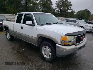 2000 GMC New Sierra 1500 SLE with VIN 1GTEK19T4YE247104, listed as a Copart auction lot 79849214 with 237,663 mi miles and Salvage Title. Bid and sale history available at carsss.com. Image 4.