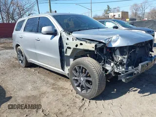 2015 Dodge Durango R/T with VIN 1C4SDJCT3FC880918, listed as a IAAI auction lot 41668958 with 125,242 mi miles and . Bid and sale history available at carsss.com. Image 1.