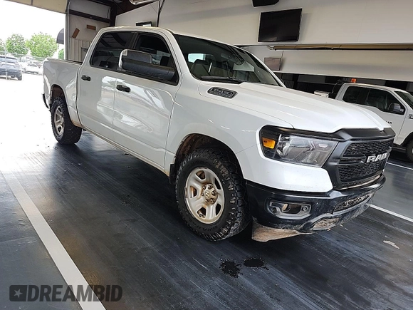 2023 Ram 1500 Tradesman with VIN 1C6SRFGT2PN560947, listed as a IAAI auction lot 42362726 with 59,862 mi miles and . Bid and sale history available at DreamBid. Image 1.