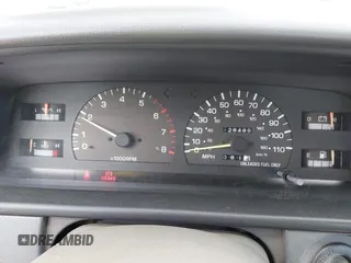 1995 Toyota T100 DX with VIN JT4VD12E6S0005957, listed as a IAAI auction lot 41943578 with 128,489 mi miles. Bid and sale history available at carsss.com. Image 7.