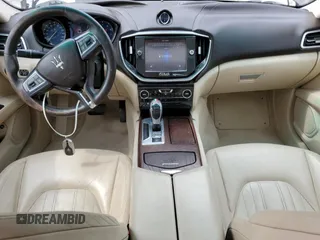 2014 Maserati Ghibli S Q4 with VIN ZAM57RTA6E1085708, listed as a Copart auction lot 53710095 with 110,799 mi miles and Salvage title. Bid and sale history available at DreamBid. Image 8.