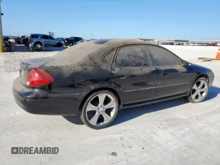 2002 Ford Taurus SE с VIN 1FAFP53252A202836, выставлен на аукционе Copart как лот 62285265 с пробегом 206 916 миль миль и Чистый • Clean title. История ставок и продаж доступна на DreamBid. Изображение 3.