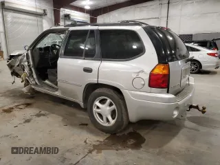 2007 GMC Envoy SLE z VIN 1GKDT13S172300399, wystawiony jako Copart lot #56978495 z przebiegiem 239 862 mil mil oraz Nie do naprawy. Historia ofert i sprzedaży dostępna na DreamBid. Obrazek 2.