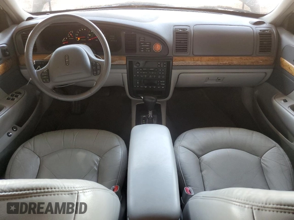 2001 Lincoln Continental with VIN 1LNHM97V31Y622782, listed as a Copart auction lot 74023344 with 116,672 mi miles and Salvage Title. Bid and sale history available at carsss.com. Image 8.