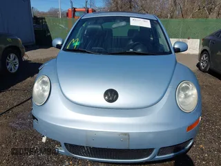 2010 Volkswagen New Beetle Coupe with VIN 3VWRW3AG2AM018644, listed as a IAAI auction lot 41815380 with 99,738 mi miles. Bid and sale history available at carsss.com. Image 12.