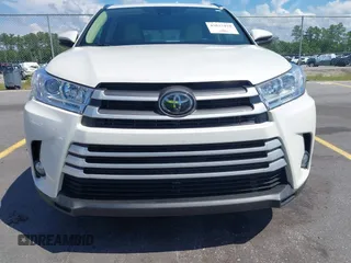 2019 Toyota Highlander SE with VIN 5TDKZRFH7KS551929, listed as a IAAI auction lot 42627458 with 84,117 mi miles and . Bid and sale history available at DreamBid. Image 6.